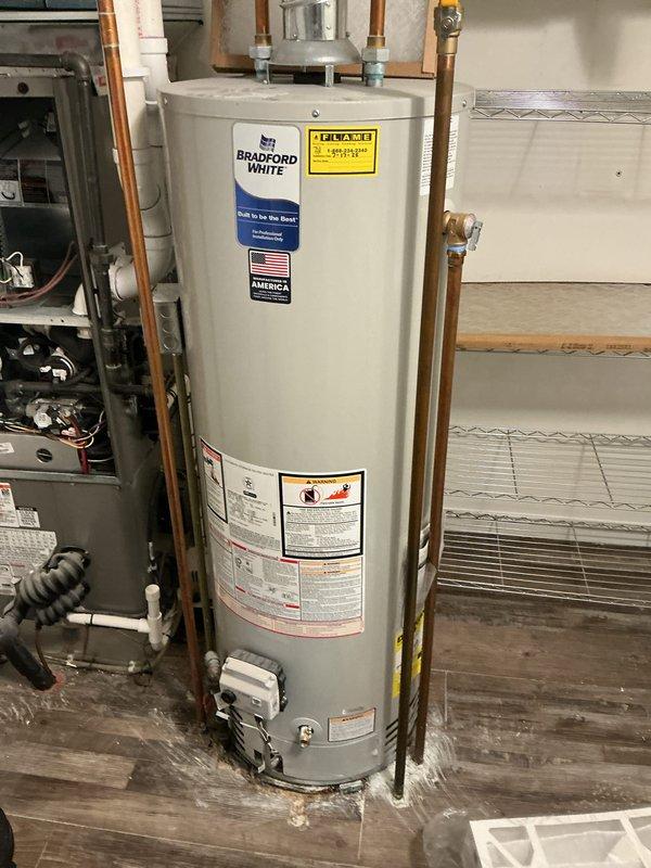 Completed comprehensive HVAC tune-up and city rental certification inspection on 1-year-old system located in laundry room mechanical space. Performed full system evaluation including thermostat operation verification, visual inspection of furnace components, and assessment of utility area conditions. Documentation and photographic evidence collected to support city certification requirements for rental property compliance.