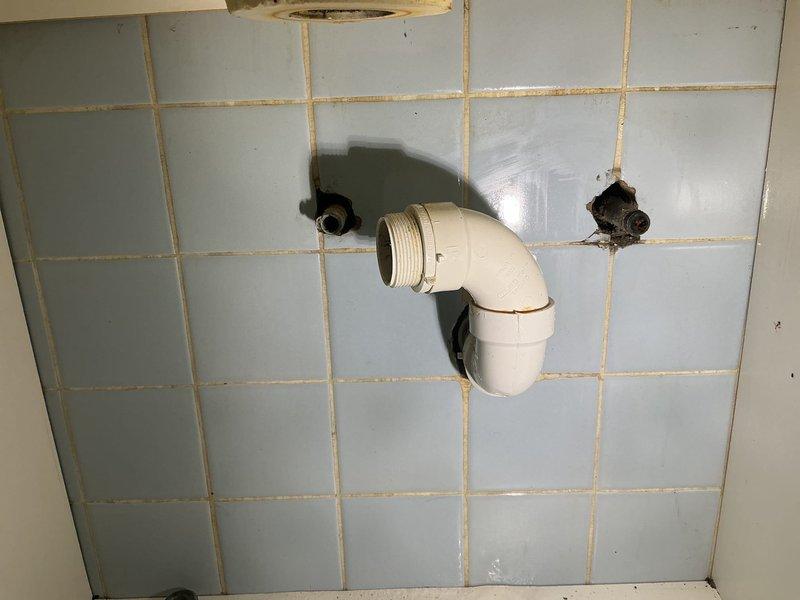 Responded to follow-up complaint regarding potentially reversed hot and cold water supply lines on previously installed kitchen faucet. Inspected under-sink plumbing connections and verified proper configuration of supply lines to ensure correct water temperature delivery at fixture. Additionally, completed installation of customer-supplied 4-inch spread bathroom faucet, including connecting supply lines through tiled wall penetrations and securing mounting hardware. Both faucets tested and verified operational with proper water flow and temperature control.