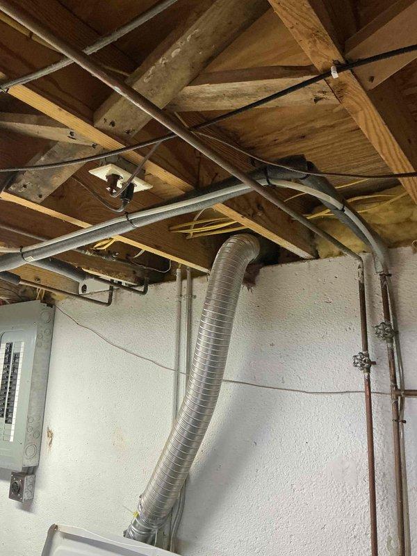 Responded to report of mold growth in condensate drain line from furnace/AC system draining into utility sink. Upon inspection, confirmed clear flexible drain hose exhibited significant mold contamination throughout interior length. Reviewed equipment history noting recent system installation and prior warranty service for internal leak and humidifier valve issue. Assessed existing Lennox G60UHV furnace and Lennox 410a air conditioning unit located in basement mechanical space. Removed contaminated condensate drain line and installed new clear flexible drain hose with proper pitch and secure connections from evaporator coil drain pan to sink drain. Verified proper drainage flow and confirmed no leaks at connection points. Tested system operation to ensure condensate removal functioning correctly. Discussed warranty coverage considerations with customer regarding drain line replacement given recent installation history. Provided quote for completed drain line replacement work. System le