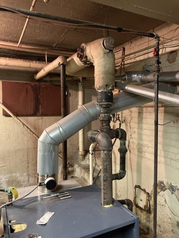 Performed annual maintenance and tune-up on a 14-year-old Lochinvar boiler system located in basement mechanical room. System was operating properly upon arrival. Completed comprehensive inspection of boiler components, including burner assembly, heat exchanger, venting system, and all associated piping connections. Verified proper operation of circulation system and safety controls. Also provided estimate for boiler system upgrades and assessed sump pump requirements as requested.