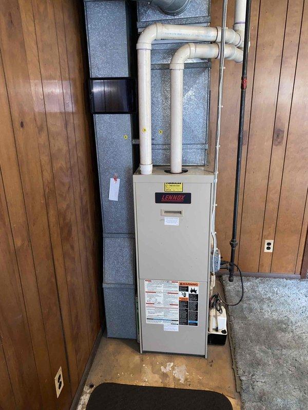 Completed comprehensive furnace inspection and estimate for replacement of existing Lennox heating system located in basement. Unit is over 10 years old and currently operational. Evaluated existing ductwork configuration including metallic flexible ducting in attic space and rigid sheet metal components. Assessed PVC venting system and overall HVAC infrastructure to provide homeowner with replacement options and recommendations for upgraded equipment.