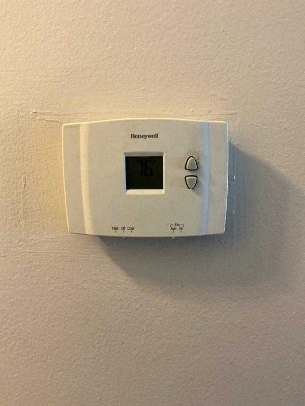 Completed Gold Furnace Inspection on a 3-year-old forced air heating system located in the basement. Performed comprehensive visual inspection of furnace unit, verified thermostat operation displaying 78 degrees, examined ductwork connections and gas line installations, and documented equipment condition through photographs. All components found to be functioning within normal parameters with no immediate service needs identified.