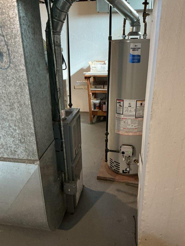 Completed Gold Furnace Inspection on a 3-year-old forced air heating system located in the basement. Performed comprehensive visual inspection of furnace unit, verified thermostat operation displaying 78 degrees, examined ductwork connections and gas line installations, and documented equipment condition through photographs. All components found to be functioning within normal parameters with no immediate service needs identified.