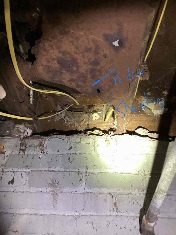Conducted estimate for furnace replacement in basement location where existing unit is non-operational. Assessment revealed significant structural deterioration in installation area, including damaged wooden beams, compromised ceiling materials with visible breaches, and exposed wall cavities requiring remediation prior to new equipment installation. Documented extensive pre-existing conditions including moisture damage, deteriorated framing members, and compromised ductwork that will need to be addressed as part of complete system replacement.