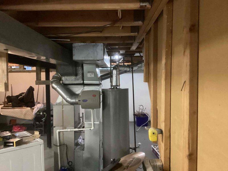 Completed annual tune-up and preventive maintenance on residential gas furnace located in basement. Performed comprehensive system inspection including burner assembly, heat exchanger, blower motor, and all safety controls. Replaced air filter, cleaned flame sensor, and verified proper ignition sequence and combustion. Checked and tested all electrical connections, capacitor, and thermostat functionality. Inspected ductwork connections and confirmed adequate airflow throughout the system. All components operating within manufacturer specifications with no issues identified.