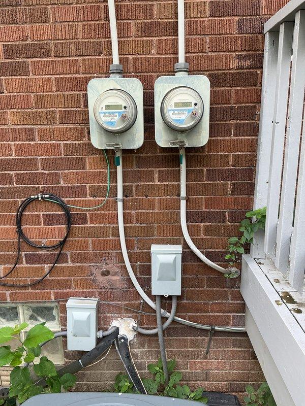 Responded to service call for exterior electrical wiring repair where conduit casing was damaged and chipped. Inspected dual electric utility meter installation on exterior brick wall and assessed condition of existing weatherproof enclosures, conduit runs, and junction boxes. Replaced damaged electrical conduit sections and secured new PVC conduit properly to brick wall with appropriate mounting hardware. Ensured all exterior wiring connections met code requirements and verified weatherproof integrity of meter enclosures and junction boxes to prevent moisture infiltration and electrical hazards.