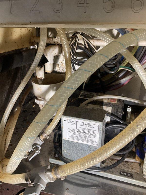 Responded to commercial plumbing service call for clogged three-compartment sink. Upon arrival, accessed mechanical compartment and inspected drainage system components, including discharge lines, pump assembly, and associated plumbing connections. Cleared blockage from drain line using appropriate tools and techniques, verified proper water flow through all three compartments, and tested drainage system under operating conditions to ensure complete restoration of function.