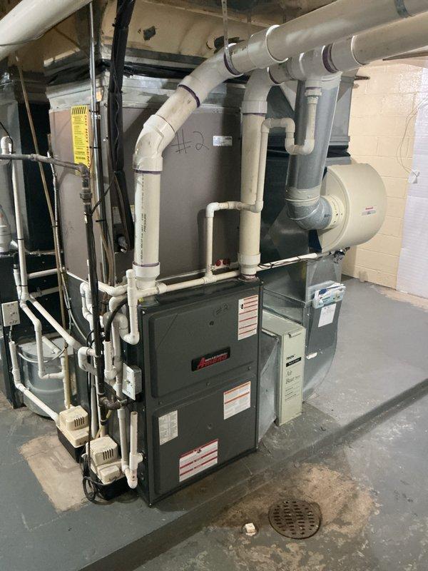 Completed fall maintenance tune-up on two 8-year-old Amana furnaces as part of annual preventive maintenance under membership plan. Performed comprehensive inspection of both units including burner assembly cleaning, heat exchanger inspection, blower motor lubrication, air filter replacement, thermostat calibration verification, safety control testing, and combustion analysis to ensure optimal efficiency and safe operation for the heating season.