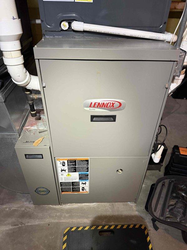 Completed comprehensive tune-up on 19-year-old Lennox G61MP-48C-090-07 furnace unit. Performed full system inspection including heat exchanger examination using borescope camera, which revealed normal condensation patterns with no cracks or deterioration detected. Conducted standard maintenance procedures including filter inspection, burner cleaning and adjustment, blower motor lubrication, electrical connection verification, gas pressure testing, and combustion analysis to ensure safe and efficient operation for the heating season.
