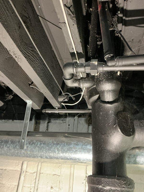 Completed comprehensive whole home plumbing inspection at residential property. Homeowner requested evaluation of existing plumbing system and assessment for potential toilet additions and overall plumbing upgrades throughout the residence.

Conducted thorough visual inspection of accessible plumbing components including water heater, supply lines, drainage systems, and distribution piping. Examined water heater installation in basement utility area, noting copper supply piping connections with shut-off valves at unit. Inspected mechanical space and attic areas where plumbing infrastructure is routed, including vertical drain stacks and horizontal supply runs. 

Evaluated condition of existing fixtures, water pressure, pipe materials, and overall system functionality. Assessed structural routing of plumbing lines through building framework and identified locations suitable for potential fixture additions. Documented current system configuration with photographic evidence showing water 