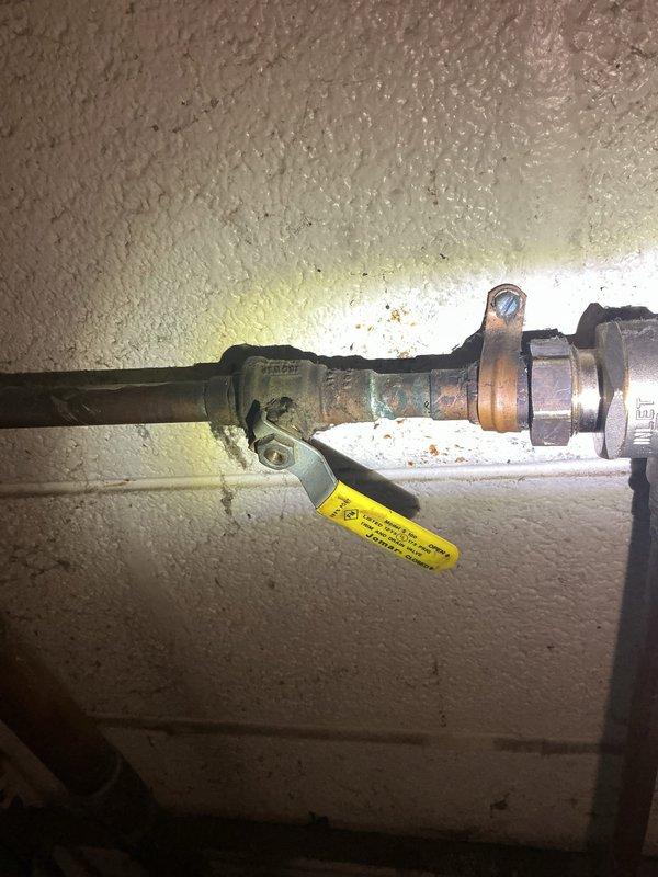 Responded to service call for first floor boiler with non-functioning pressure gauge. Upon inspection, found older boiler system with visible corrosion on internal components and deteriorated insulation material showing signs of age and dirt accumulation. Assessed gas piping assembly with ball valve and confirmed proper operation. Evaluated overall system condition and determined boiler pressure gauge requires replacement, while internal components show significant wear consistent with extended service life requiring attention.