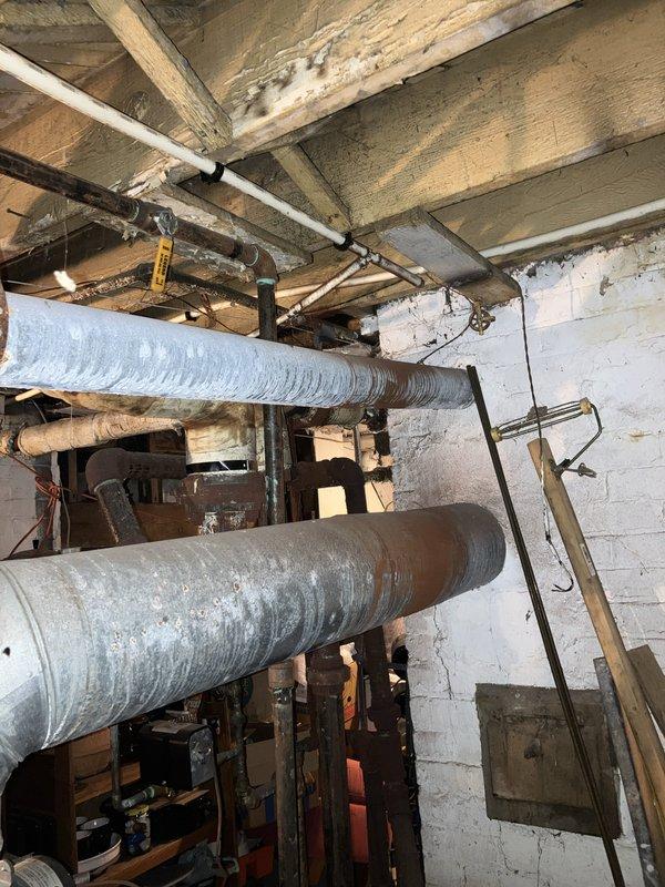 Responded to maintenance technician's findings of a leaking boiler system. Conducted on-site assessment and documented existing conditions including thermostat operation and mechanical infrastructure in basement area. Scheduled appointment required rescheduling to complete equipment evaluation and provide replacement recommendations.