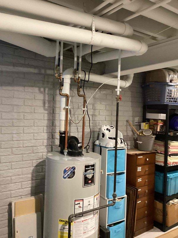 Conducted site assessment for Kohler generator installation estimate at residential property. Evaluated basement utility area with existing water heater and plumbing infrastructure to determine electrical routing and equipment placement requirements. Surveyed exterior location marked on lawn near foundation for optimal generator positioning, considering proximity to natural gas or LP fuel source, electrical service panel access, and clearance requirements per manufacturer specifications and local code compliance.