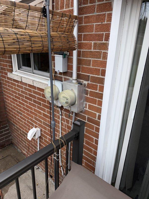 Completed full HVAC system installation including 45,000 BTU furnace, 2-ton air conditioning unit with rear discharge configuration, Honeywell Home programmable thermostat, and humidifier. Requested mechanical and electrical permits prior to installation. Reconnected existing electrical circuits and performed system remeasure for utility rebate qualification. Installed condensate pump and exterior condensate drainage line with PVC piping secured to building exterior. Mounted outdoor condenser unit on exterior wall with proper clearances. Programmed new digital thermostat and verified proper communication with equipment. All systems tested and operational upon completion.