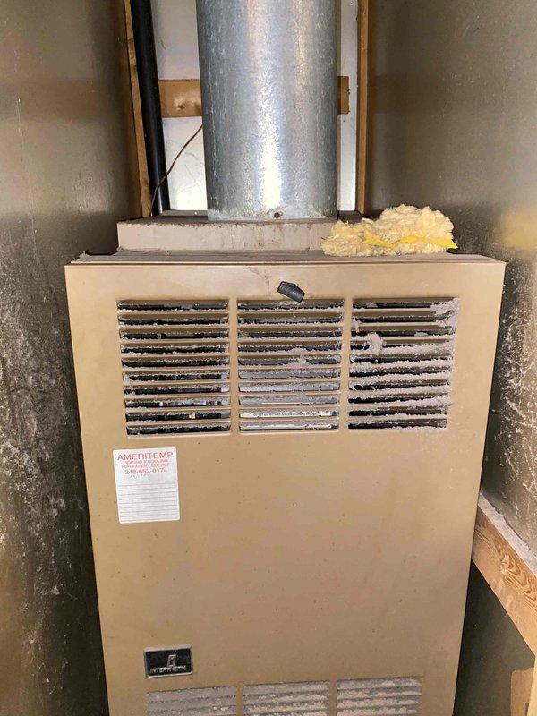 Conducted estimate for natural gas furnace replacement in basement location. Current heating unit is non-operational and requires full replacement. Assessed existing installation including electrical panel, ductwork configuration, and equipment accessibility to provide comprehensive replacement options.