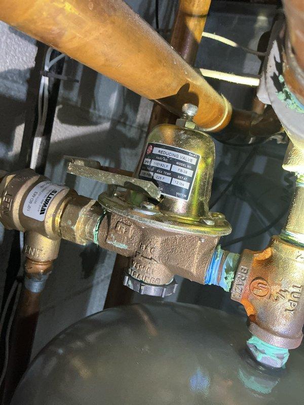 Completed annual heating maintenance and tune-up on an 8-year-old Weil-McLain boiler system. System was found operating properly with boiler temperature reading 190°F on digital display, all indicator lights functioning correctly including power, relay, and flame status LEDs. Inspected and documented pressure reducing valve, copper piping connections, and control panel components; noted existing copper oxidation on piping but no immediate service concerns. Customer renewed maintenance membership to cover this appointment.
