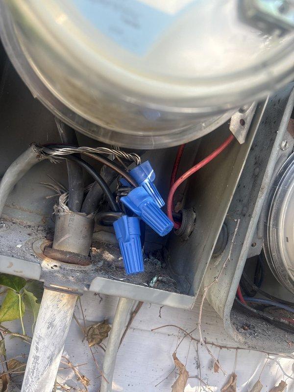 Responded to service call for incorrectly routed wiring from dual meter boxes causing hot water heater malfunction. Upon inspection, identified crossed conductors in basement electrical panel affecting water heater circuit. Traced wiring from both meter boxes through conduit runs to panel, verified proper phasing and circuit assignments. Corrected wire routing at panel connections, ensuring proper hot and neutral conductor assignments to water heater circuit. Secured all wire connections with appropriate wire nuts, verified voltage at water heater terminals, and confirmed proper operation of unit upon restoration of power.