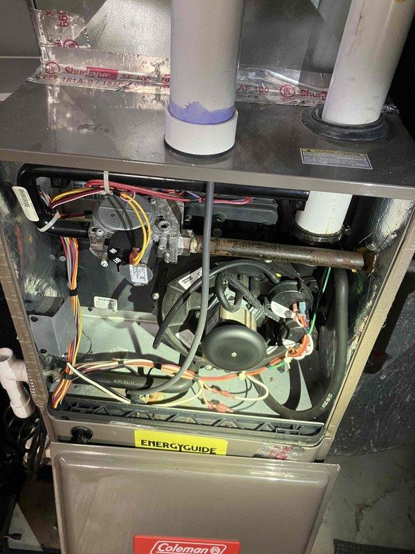 Completed comprehensive Gold Plan furnace inspection on 9-year-old Coleman unit located in basement. Verified system operation, inspected all internal components including blower motor, heat exchanger, gas valve assembly, and electrical connections. Checked and confirmed proper function of integrated Aprilaire humidifier system with associated PVC drainage lines. All components found in good working condition with no immediate service needs identified. System operating within manufacturer specifications.