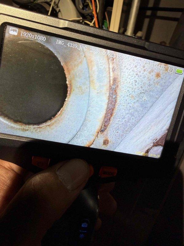 Responded to no heat concern on 20-year-old Lennox G26Q3-50 forced air furnace in basement. Performed comprehensive system inspection and diagnostic testing using clamp meter to verify electrical readings and borescope camera to inspect heat exchanger. Internal inspection revealed extensive rust and corrosion throughout heat exchanger with significant deterioration visible on interior surfaces. Advised customer that heat exchanger failure presents safety hazard due to potential carbon monoxide leakage and unit has reached end of serviceable life. Recommended immediate replacement of furnace given age of equipment and severity of corrosion found. Provided replacement options and discussed system sizing requirements for home.