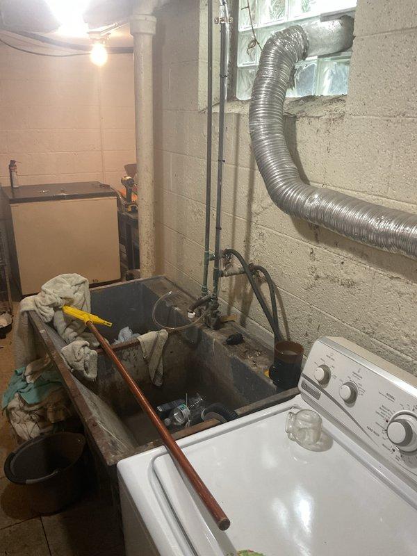 Completed full HVAC system installation including a 90,000 BTU high-efficiency furnace, 3-ton air conditioning unit with rear placement, and programmable thermostat. Installed 40-gallon water heater with proper venting and pressure relief valve configuration, connected all copper supply lines and drainage systems. Added whole-home humidifier to furnace system for improved indoor air quality. Performed complete system flush and reconnected all electrical components to code. Installed condensate pump with 5x35 configuration for proper drainage management. All mechanical, electrical, and plumbing permits were secured prior to installation. System tested and verified operational, with utility rebate documentation completed for energy-efficient equipment.