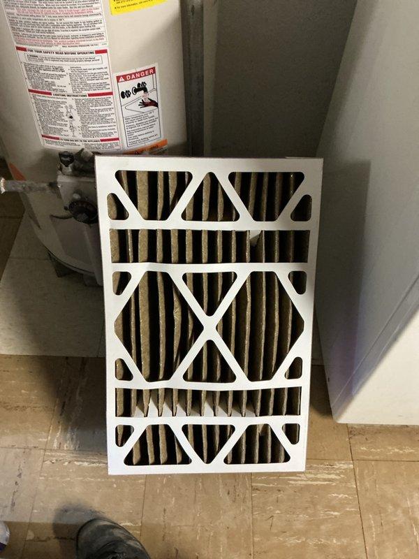 Responded to no heat call on 2023 forced air furnace located in basement. Upon inspection, found severely restricted air filter causing inadequate airflow and preventing unit from heating properly. Removed and replaced dirty air filter with new filter, restoring proper airflow to system. Verified furnace operation, confirmed unit now heating normally and delivering warm air throughout home.