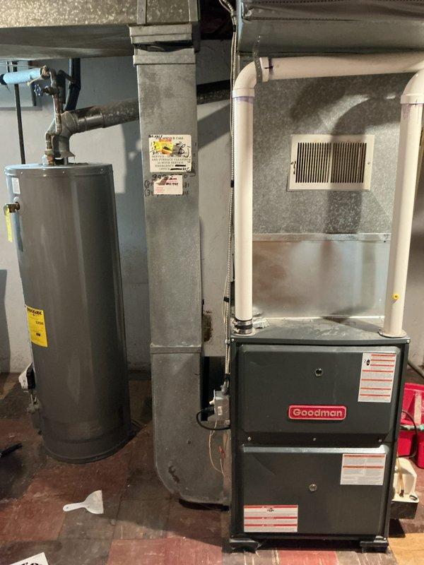 Completed comprehensive furnace tune-up on 6-year-old Goodman unit in basement location. Performed full inspection of burner assembly, heat exchanger, and blower motor components. Verified proper ignition sequence, flame sensor operation, and burner flame pattern across all burner tubes. Tested all electrical connections and safety controls for proper function. System operating within manufacturer specifications with no issues identified.