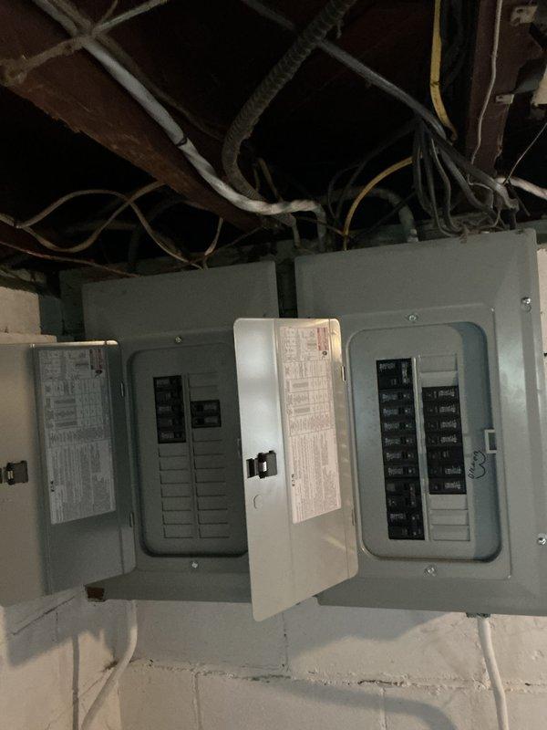 Completed full system assessment of existing HVAC equipment located in basement utility area of upstairs/downstairs duplex property. Inspected gray metal furnace unit with metallic exhaust pipe and insulation wrap, evaluated condition of copper supply lines with shutoff valve, and assessed ductwork distribution system. Documented current system configuration including PVC condensate drainage, electrical service panels with multiple breaker boxes, and overall equipment accessibility in common basement area. Provided comprehensive replacement quote for complete HVAC system upgrade based on current equipment age and homeowner's request for full system replacement options.