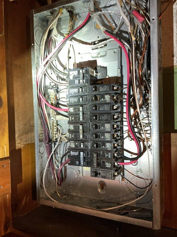 Responded to service call for flickering lights throughout the home. Performed visual inspection of main electrical panel and identified loose connections on multiple circuit breakers contributing to intermittent power delivery. Tightened all breaker connections, verified proper seating of breakers in bus bars, and inspected wire terminations at neutral and ground bars. Tested circuits under load to confirm stable power flow and resolution of flickering condition.