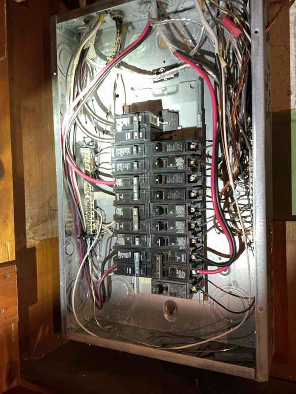 Responded to service call for flickering lights throughout the home. Performed visual inspection of main electrical panel and identified loose connections on multiple circuit breakers contributing to intermittent power delivery. Tightened all breaker connections, verified proper seating of breakers in bus bars, and inspected wire terminations at neutral and ground bars. Tested circuits under load to confirm stable power flow and resolution of flickering condition.