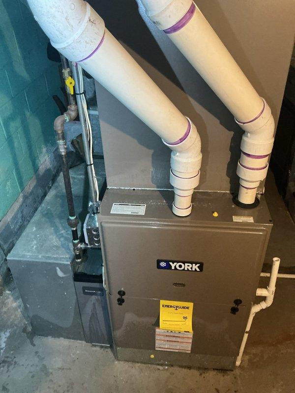 Responded to no airflow complaint on 4-year-old York AC system located in basement. Upon inspection, diagnosed failed blower motor and control module preventing air circulation. Ordered replacement blower motor and module from parts supplier, which are now available for installation. System requires parts installation to restore proper airflow and cooling operation.