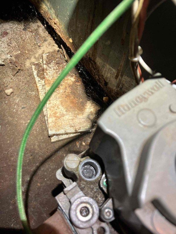 Completed comprehensive tune-up and inspection of 15-year-old boiler system for new homeowners. Performed full system evaluation including combustion analysis with digital manometer showing draft pressure readings, visual inspection of heat exchanger, burner assembly, and control components. Observed significant rust and corrosion on surrounding metal surfaces and structural components in mechanical room, though boiler itself remained operational. Provided detailed instruction to homeowners on proper system operation, thermostat programming, and maintenance best practices for efficient heating performance. System tested and confirmed working properly upon completion.
