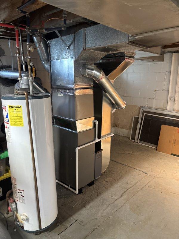 Installed 70,000 BTU furnace system with new thermostat, humidifier, and reconnected existing electrical connections. Secured mechanical and electrical permits prior to installation and completed all ductwork connections to existing infrastructure. System tested and operational upon completion.