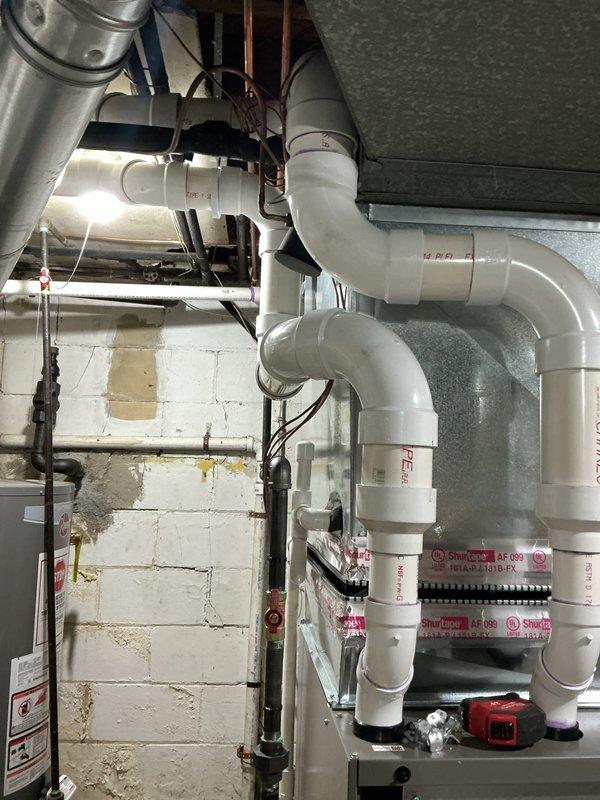 Completed installation of 110,000 BTU furnace with base and humidifier system. Installed Ecobee 3 Lite smart thermostat, reconnected existing electrical connections, and remeasured supply ductwork for proper airflow. Installed new PVC venting system with proper drainage configuration, requested mechanical and electrical permits, and verified system qualifies for utility rebate program.