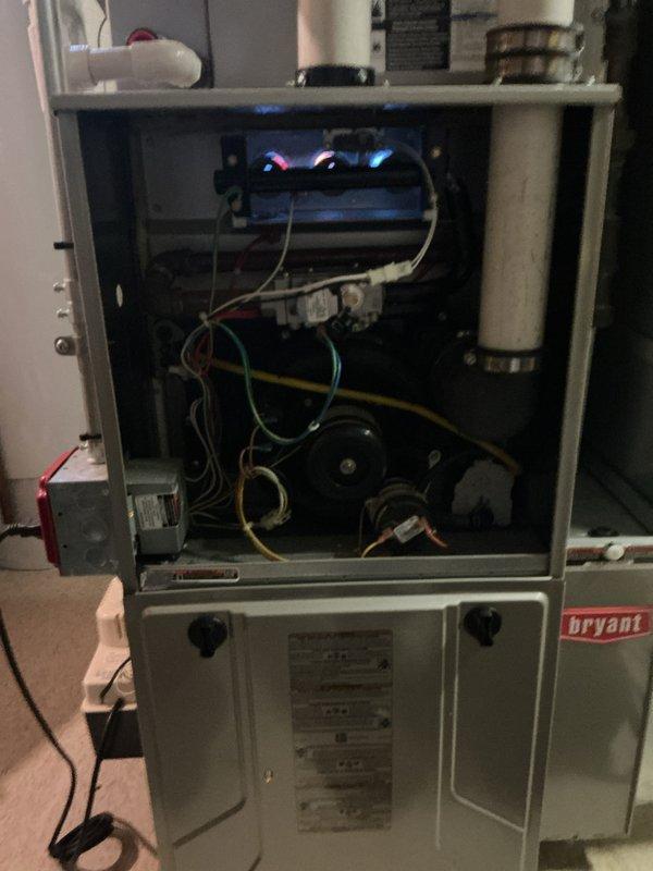 Responded to no-heat call on 12-year-old Bryant furnace located in basement with blinking diagnostic light. Performed comprehensive system diagnostics using digital manometer to verify pressure and temperature readings across multiple test points. Opened furnace cabinet to inspect internal components, control board, and wiring connections. Identified issue preventing unit operation, addressed blinking fault code on control board, and restored furnace to proper working condition. Verified blower motor assembly, electrical connections, and all safety controls functioning properly. System tested and confirmed operational upon completion.