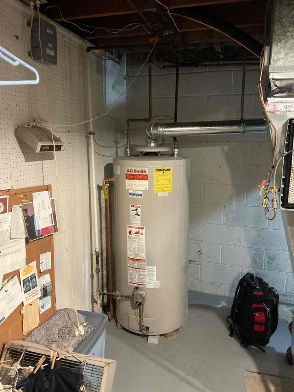 Completed Gold Furnace Inspection on 2-year-old forced air system located in basement. Performed comprehensive maintenance inspection per gold service plan protocol. Inspected and evaluated all furnace components, burners, heat exchanger, blower assembly, and safety controls. Verified proper operation of thermostat and system cycling. 

Addressed customer concern regarding split observed in refrigerant line set insulation on exterior AC system. Inspected outdoor condensing unit and refrigerant lines running along exterior wall. Confirmed split in insulation covering on refrigerant line set is cosmetic and does not affect system performance or refrigerant containment. Copper refrigerant lines are intact with no leaks detected. Advised customer this is normal wear on external insulation and does not require immediate repair, though insulation can be replaced for aesthetic purposes if desired.

Verified all electrical connections secure at furnace and outdoor unit. Checked condensate drai
