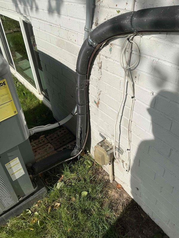Completed Gold Furnace Inspection on 2-year-old forced air system located in basement. Performed comprehensive maintenance inspection per gold service plan protocol. Inspected and evaluated all furnace components, burners, heat exchanger, blower assembly, and safety controls. Verified proper operation of thermostat and system cycling. 

Addressed customer concern regarding split observed in refrigerant line set insulation on exterior AC system. Inspected outdoor condensing unit and refrigerant lines running along exterior wall. Confirmed split in insulation covering on refrigerant line set is cosmetic and does not affect system performance or refrigerant containment. Copper refrigerant lines are intact with no leaks detected. Advised customer this is normal wear on external insulation and does not require immediate repair, though insulation can be replaced for aesthetic purposes if desired.

Verified all electrical connections secure at furnace and outdoor unit. Checked condensate drai