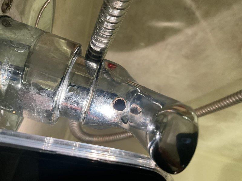 Responded to service call for leaking shower handle caused by worn-out internal components. Removed and replaced defective faucet cartridge assembly, including O-rings and seals. Tested fixture operation after installation to confirm proper function and verified no further leaks were present.