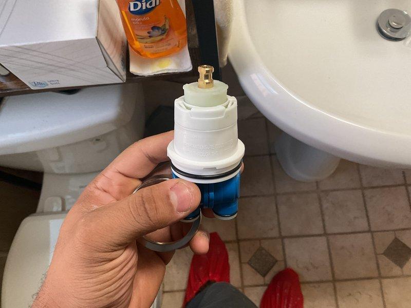Responded to service call for leaking shower handle caused by worn-out internal components. Removed and replaced defective faucet cartridge assembly, including O-rings and seals. Tested fixture operation after installation to confirm proper function and verified no further leaks were present.