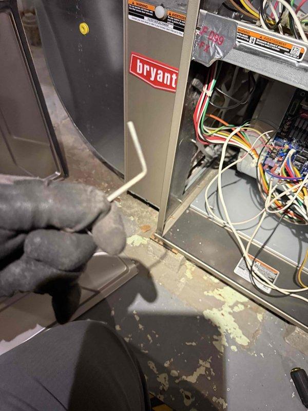 Completed comprehensive Gold furnace inspection on Bryant heating system located in basement. Unit is approximately 14 years old and currently operational. Performed thorough examination of internal electrical components, including circuit board, wiring connections, and control systems with access panel open for full diagnostic access. Inspected all wire connections for proper termination and secure mounting. Tested system operation and verified proper functionality of all heating components. Documented equipment condition with detailed photography of internal components and overall system installation. All safety labels and manufacturer warnings verified in place and legible. System found to be in operational condition with no immediate service needs identified during inspection.