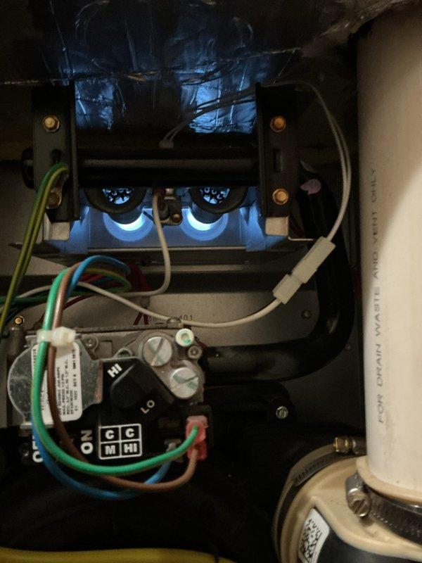 Completed Gold Furnace Inspection on two residential furnace units—one 7-year-old unit located in basement utility room and one unit of unknown age located in upstairs utility closet. Performed comprehensive safety and performance evaluation on both systems including visual inspection of heat exchangers, burner assemblies, and ignition components. Verified proper burner flame characteristics with both units showing healthy blue flames indicating optimal combustion. Conducted combustion analysis testing with digital analyzer, recording oxygen levels at 8.9%, CO2 at 6.9%, and combustion efficiency at 96.5% with supply temperature reading 98.1°F. Inspected all electrical connections, control boards, and wiring for proper operation and safety. Checked blower assemblies, air filters, and venting systems. Both furnace units operating within manufacturer specifications with no immediate safety concerns identified.