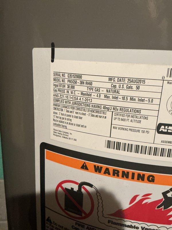 Completed comprehensive Gold Furnace Inspection on a 10-year-old forced air heating system located in the basement. Inspected Rheem model PROJ050-38N RH50 natural gas water heater (manufactured August 2015) with 38,000 BTU/H input and 50-gallon capacity, verifying all manufacturer specifications, safety labels, and warning decals were intact and legible. Examined internal components including gas manifold, burner assembly, venting system, PEX water lines, electrical wiring, and circulator pump, confirming all components were properly secured and operational with no visible signs of deterioration or safety concerns.