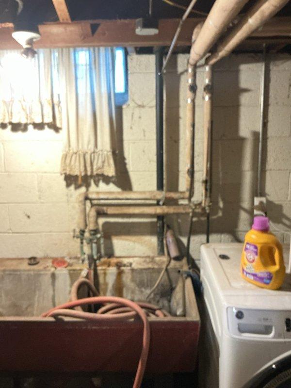Responded to basement plumbing emergency involving a significant water leak at the basement sink and a clogged drain line. Upon arrival, inspected the utility area and identified the source of the leak in the sink plumbing system. Cleared the clogged pipe in the basement using appropriate drain cleaning methods to restore proper drainage. Repaired the leaking connection at the basement sink, tested all fixtures for proper operation, and verified no additional leaks were present in the surrounding copper piping and water supply lines.