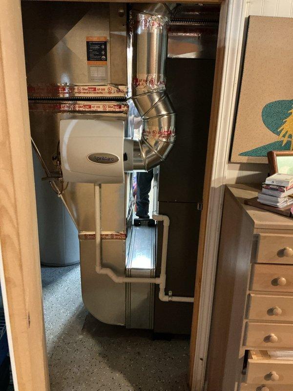 Completed full HVAC system installation including 90,000 BTU furnace and 3-ton air conditioning unit in utility closet. Installed new thermostat, Aprilaire humidifier, condensate pump with PVC drain lines, and all necessary electrical connections and refrigerant lines. Secured mechanical and electrical permits, positioned AC condenser in rear yard, and coordinated utility rebate eligibility. All equipment tested and operational upon completion.