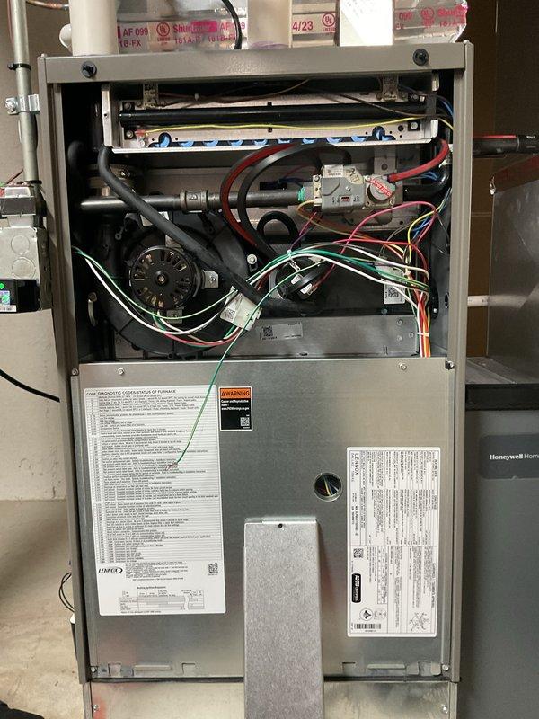Completed comprehensive fall tune-up and inspection on 2-year-old Lennox furnace located in basement as part of Gold maintenance plan. Performed full system diagnostics including blower motor assembly inspection, flame sensor evaluation, electrical connection verification, and heat exchanger examination. All internal components including ignition system, wiring harnesses, and safety controls found in excellent operational condition with no signs of wear or deterioration. Verified proper airflow, tested all safety switches, and confirmed system is heating efficiently and ready for winter season.