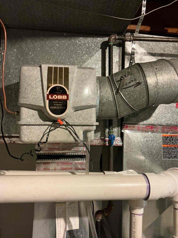Completed comprehensive Gold furnace inspection on 12-year-old forced air system located in basement. Performed full system evaluation including visual inspection of ductwork, humidifier unit with water panel, electrical connections, and all associated components. Verified proper operation of heating equipment, checked humidifier functionality and mounting hardware, inspected PVC drainage system, and documented equipment condition with photographic records. All components found operating within normal parameters with no immediate service needs identified.