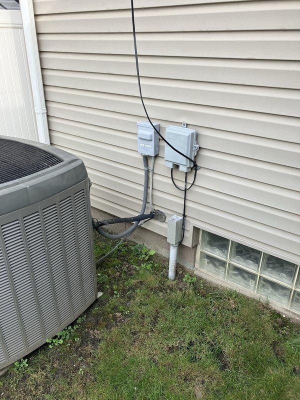 Conducted comprehensive full system replacement estimate for 20-year-old Lennox G61MPV furnace and Lennox XC15 air conditioning system, both located in basement. Evaluated existing outdoor condensing unit positioned on concrete pad with proper clearances, inspected electrical disconnect and conduit connections along exterior wall, and assessed overall system condition and installation accessibility. Documented equipment specifications, reviewed current system performance limitations due to age, and provided recommendations for modern high-efficiency replacement options to improve home comfort and energy efficiency.