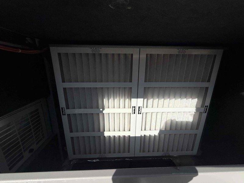 Performed comprehensive commercial HVAC maintenance inspection on six units including four rooftop units and two ceiling-mounted air handlers. Relit pilots on furnace equipment to restore proper heating operation. Accessed rooftop equipment using ladder and inspected ceiling-mounted units from interior locations. Conducted thorough inspection of all air handling components including blower assemblies, flexible ductwork, and galvanized support structures. Inspected and evaluated air filtration systems, verifying proper installation of pleated media filters in ceiling-mounted units. Assessed condition of insulation materials on ductwork and mechanical components. Verified operational status of all heating and cooling systems, confirming equipment functionality following pilot relight procedure. Documented equipment conditions through photographic records showing filter installations, duct configurations, and mechanical assemblies in attic and mechanical spaces.