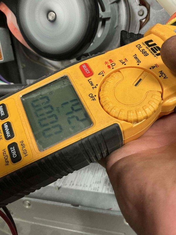 Completed comprehensive Gold Plan furnace inspection on 12-year-old unit in basement. Performed full system diagnostics including electrical measurements using clamp meter, verifying amperage draw at 0.25A and voltage readings of 49.5V at 60Hz on blower motor assembly. Inspected all electrical connections, wiring harness, and motor components for proper operation. Verified all safety labels and warning placards present and legible. System operating within normal parameters with no deficiencies noted. All electrical readings within manufacturer specifications. Unit tested and confirmed operational for continued service.