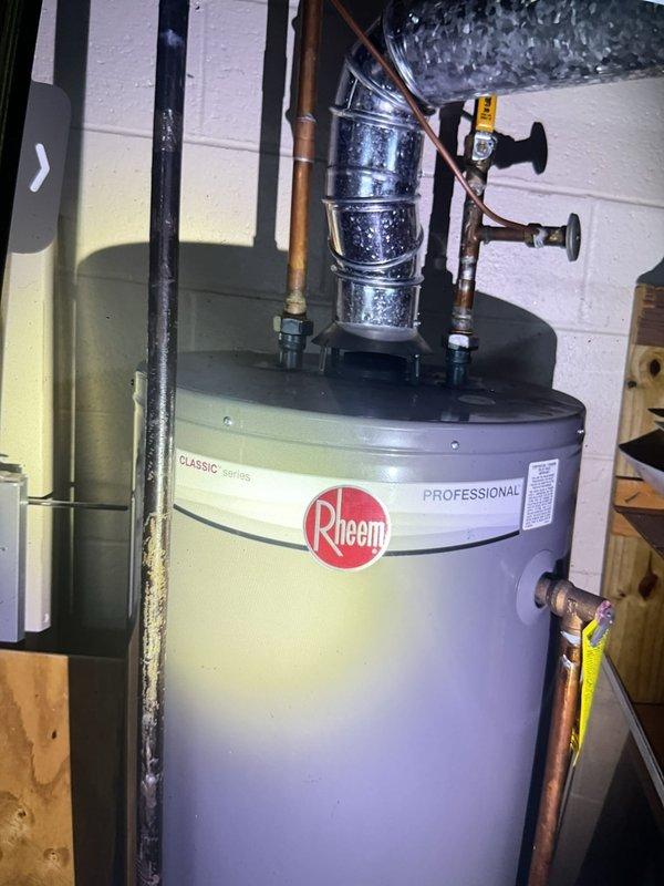 Completed comprehensive tune-up on 12-year-old HVAC system located in basement. Performed full inspection including furnace operation check, humidifier assessment, thermostat calibration verification, and hot water tank examination. System evaluated for proper operation with all components functioning within normal parameters; routine maintenance procedures completed per manufacturer specifications.