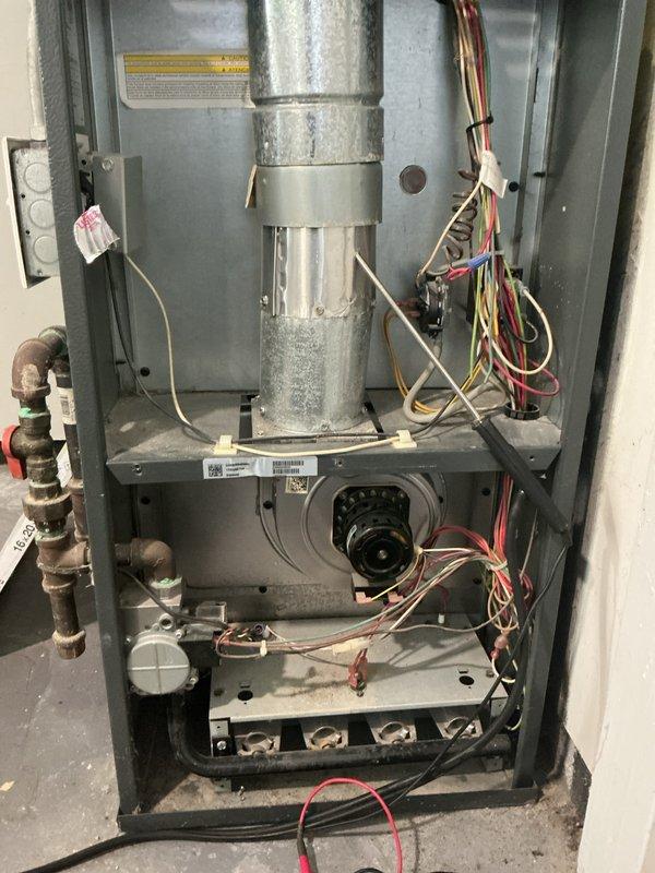 Completed comprehensive tune-up and safety inspection on two forced air furnace systems, one located upstairs and one downstairs, both over 10 years old. Removed access panels and performed thorough examination of all mechanical and electrical components including blower motor assemblies, heat exchangers, gas supply lines with shut-off valves, electrical wiring harnesses, and ductwork connections. Verified proper operation of all safety controls, inspected burner assembly and flame characteristics, checked electrical connections for signs of wear or corrosion, and confirmed gas line integrity with visible shut-off valves properly tagged. All systems found to be operating within normal parameters with no immediate repairs required.